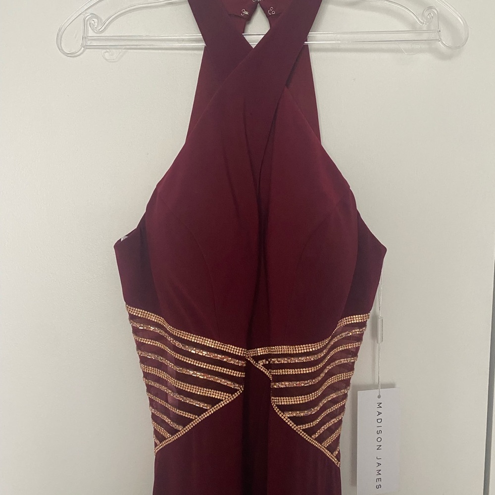 Madison James red and gold prom dress.